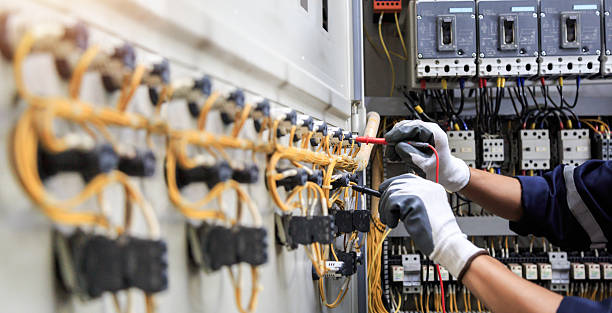 Professional Electrician technician working in Highland Park, IL